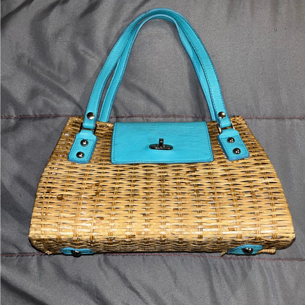 The limited wicker over the shoulder purse